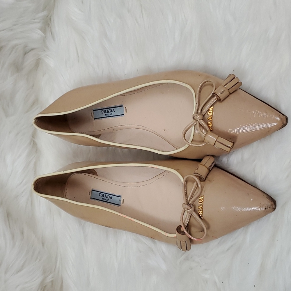 Prada cream leather flat shoes metal logo women size 37.5